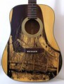 /products/guitarra-acustica-con-estapado-y-diseno/